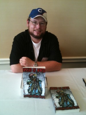 At Horrorfind 2011 at the signing table after my reading.  Only one book and if I did it today it would be over twenty.